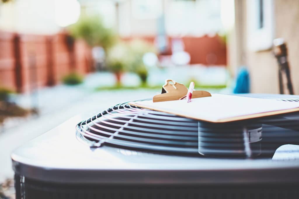 Ac with a clipboard and paper